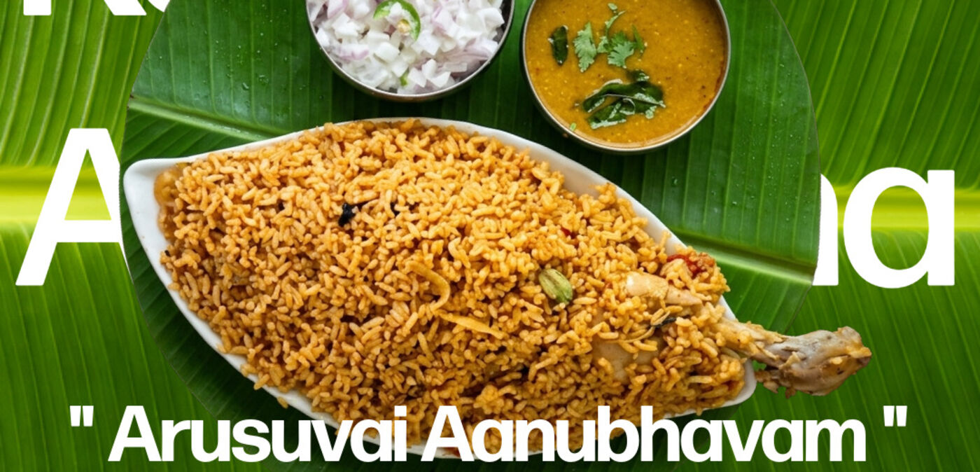 Signature biryani served on a banana leaf with onion salad and sambar